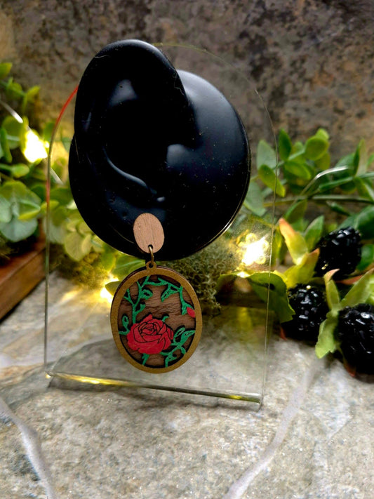 Spring Rose Earrings on a display ear