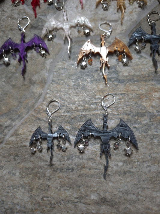 Comparison of small and large dragon earrings size
