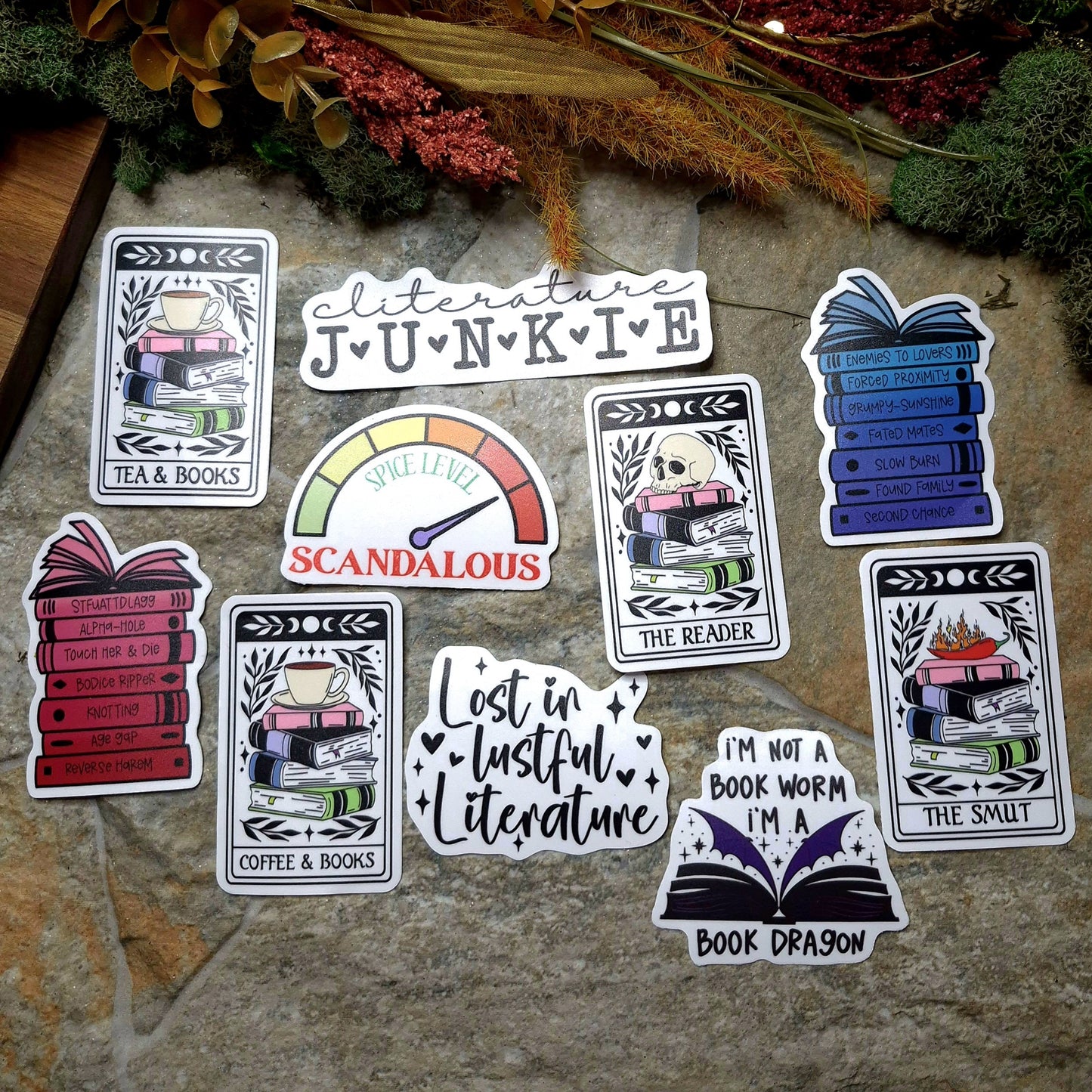 Various Book Stickers on a stone background
