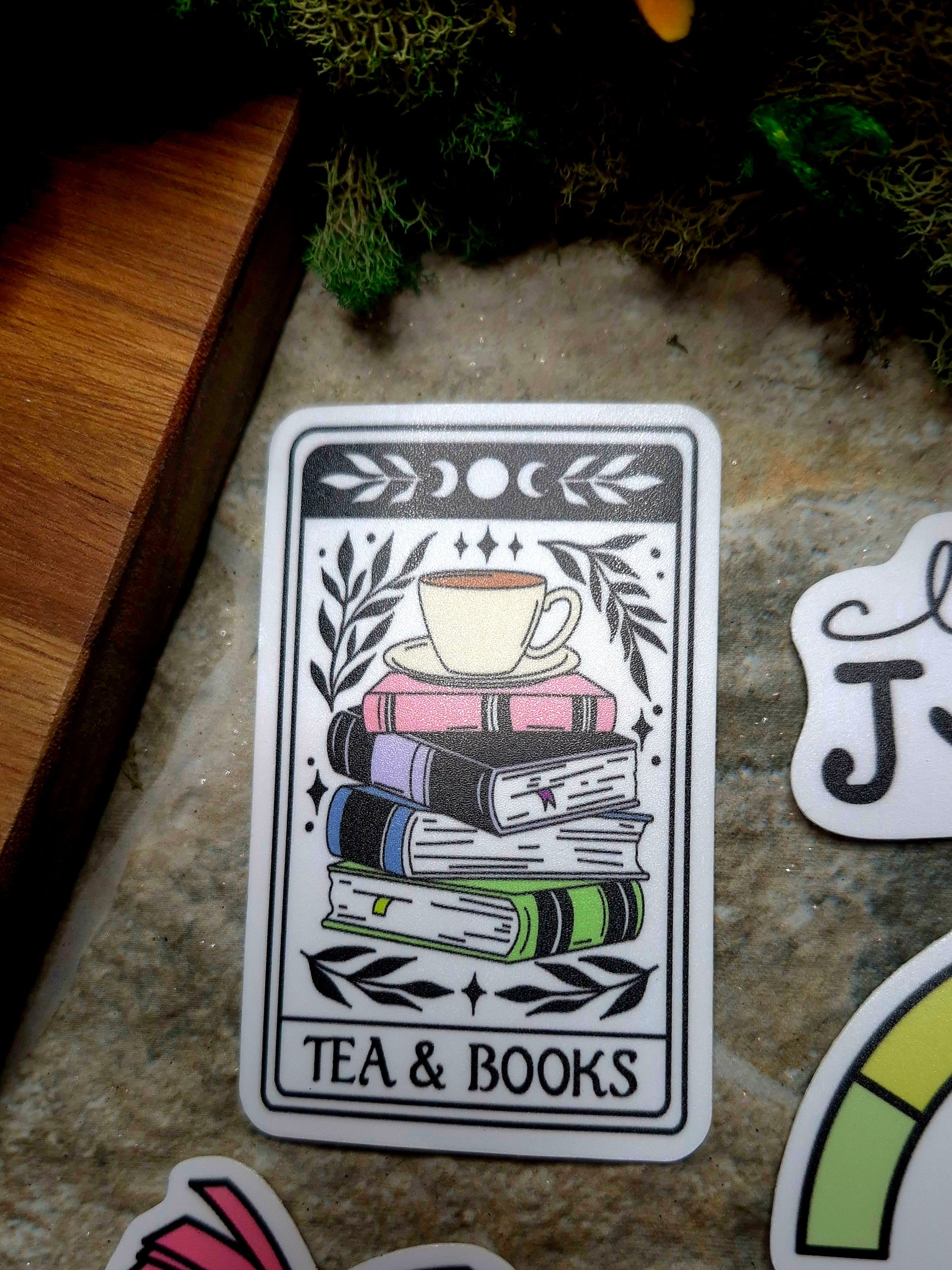 Tea & Books Tarot Sticker on a stone background. 