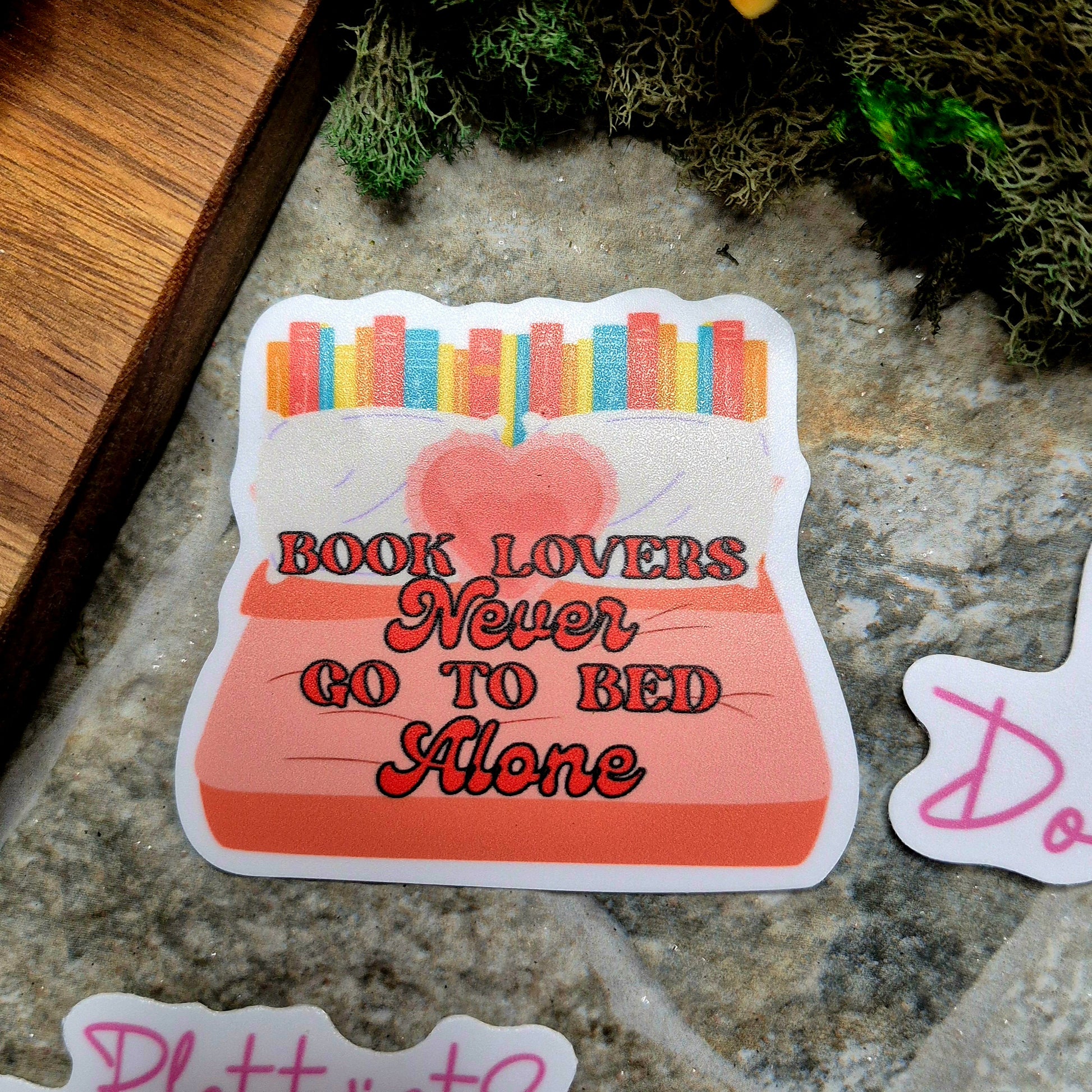 book lovers sticker on a stone background 