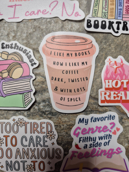Like my books like my coffee sticker on a stone background.