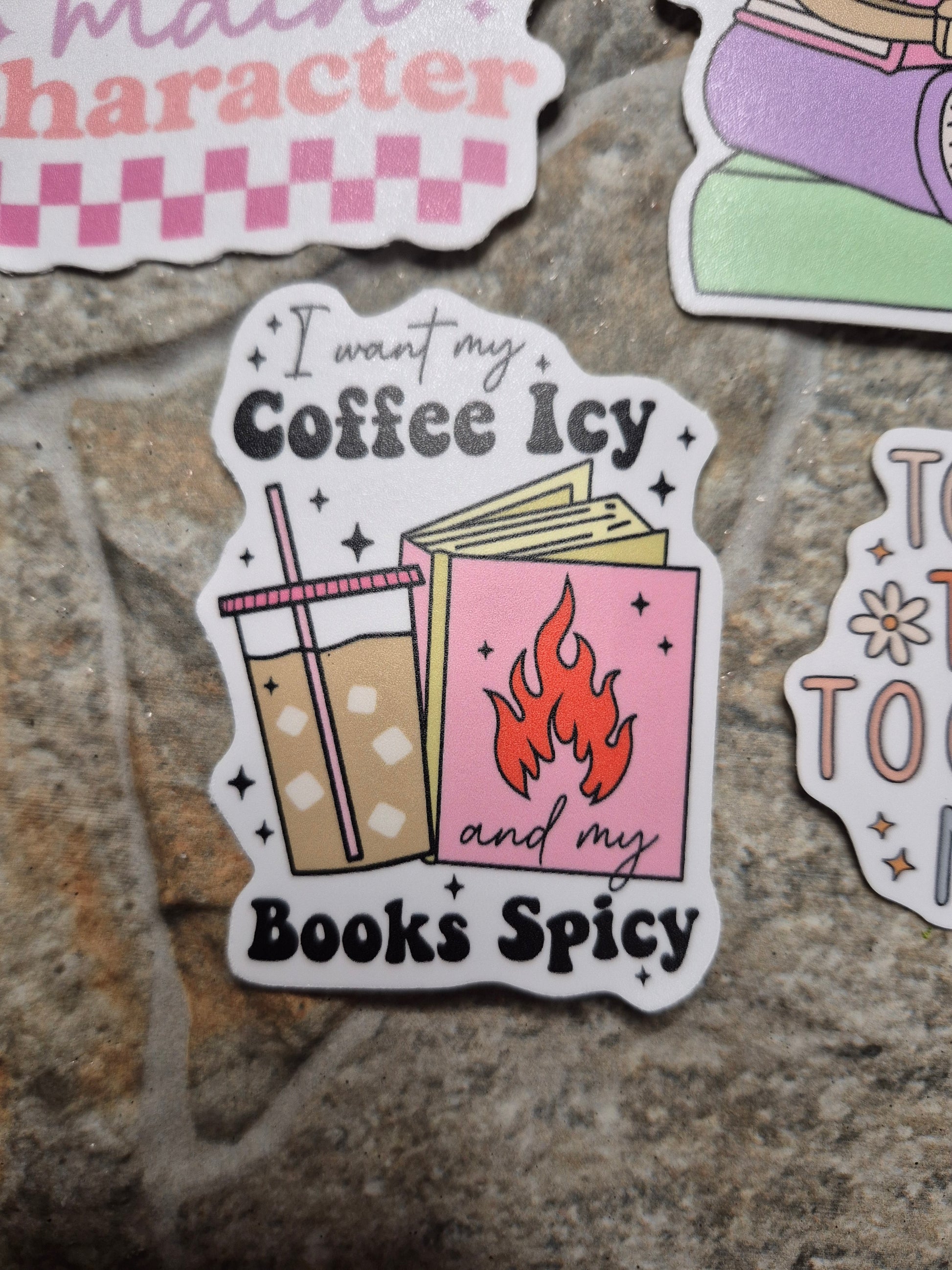 coffee icy books spicy sticker on a stone background 
