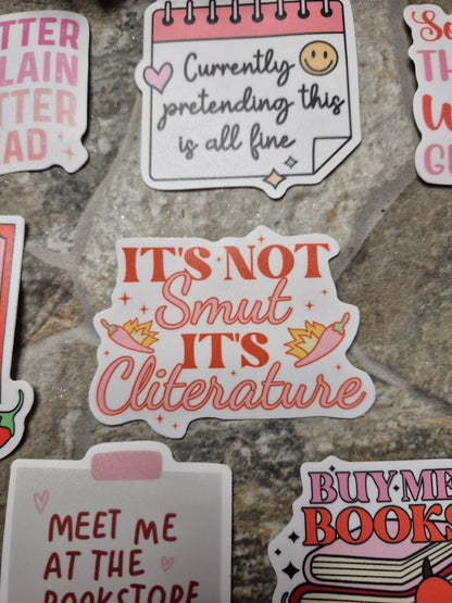 cliterature sticker on stone background 