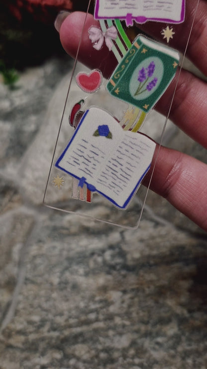 video of romantasy bookmark on a stone background