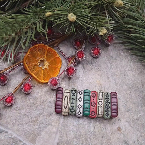 video close up of Bookstack clip on a wood and stone background surrounded by foliage