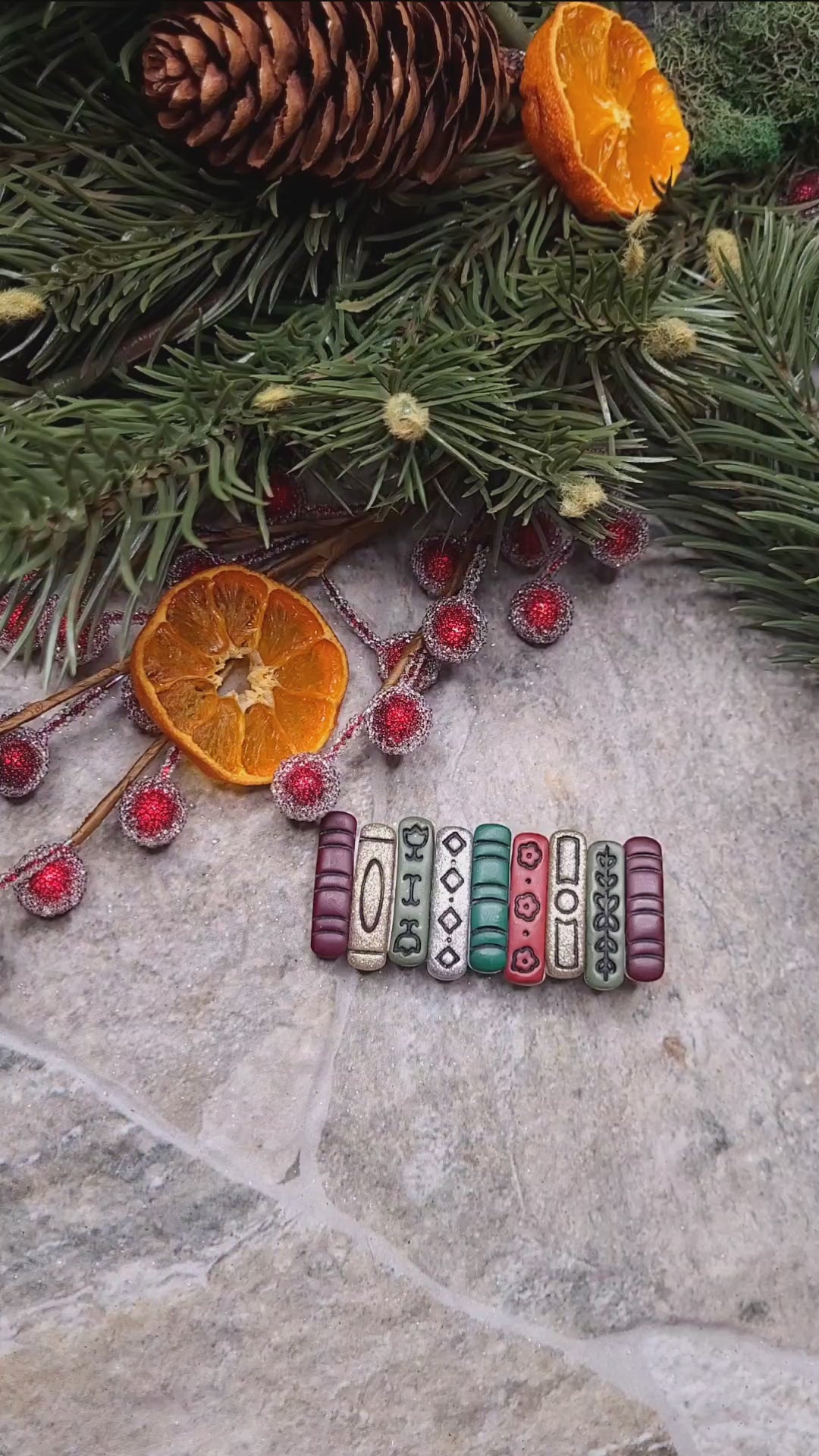 video close up of Bookstack clip on a wood and stone background surrounded by foliage