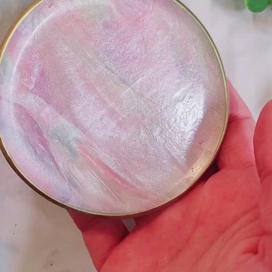 video close up of the mother of pearl trinket dish.