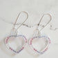 Closeup of the Trans Love Is Love Earrings