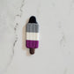 Closeup of the Asexual Pride Flag Bomb Pop Pin