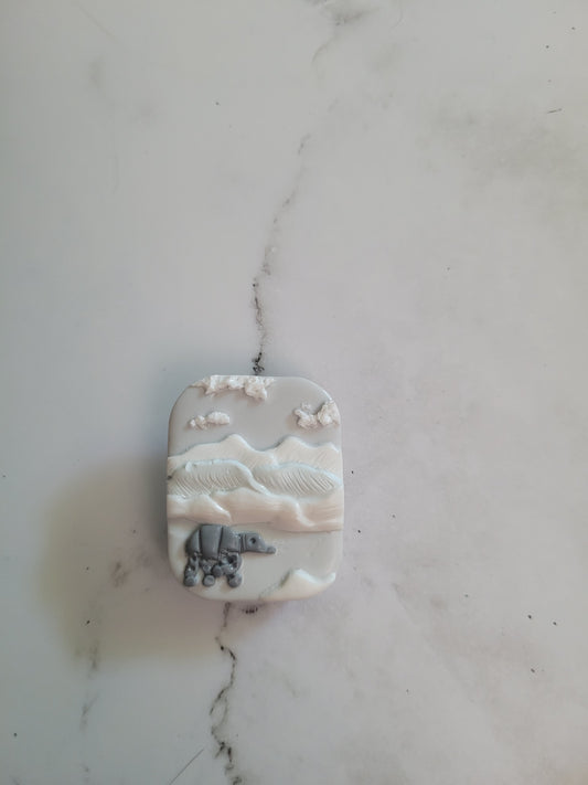 Close up of rectangle Brooch with a icy landscape
