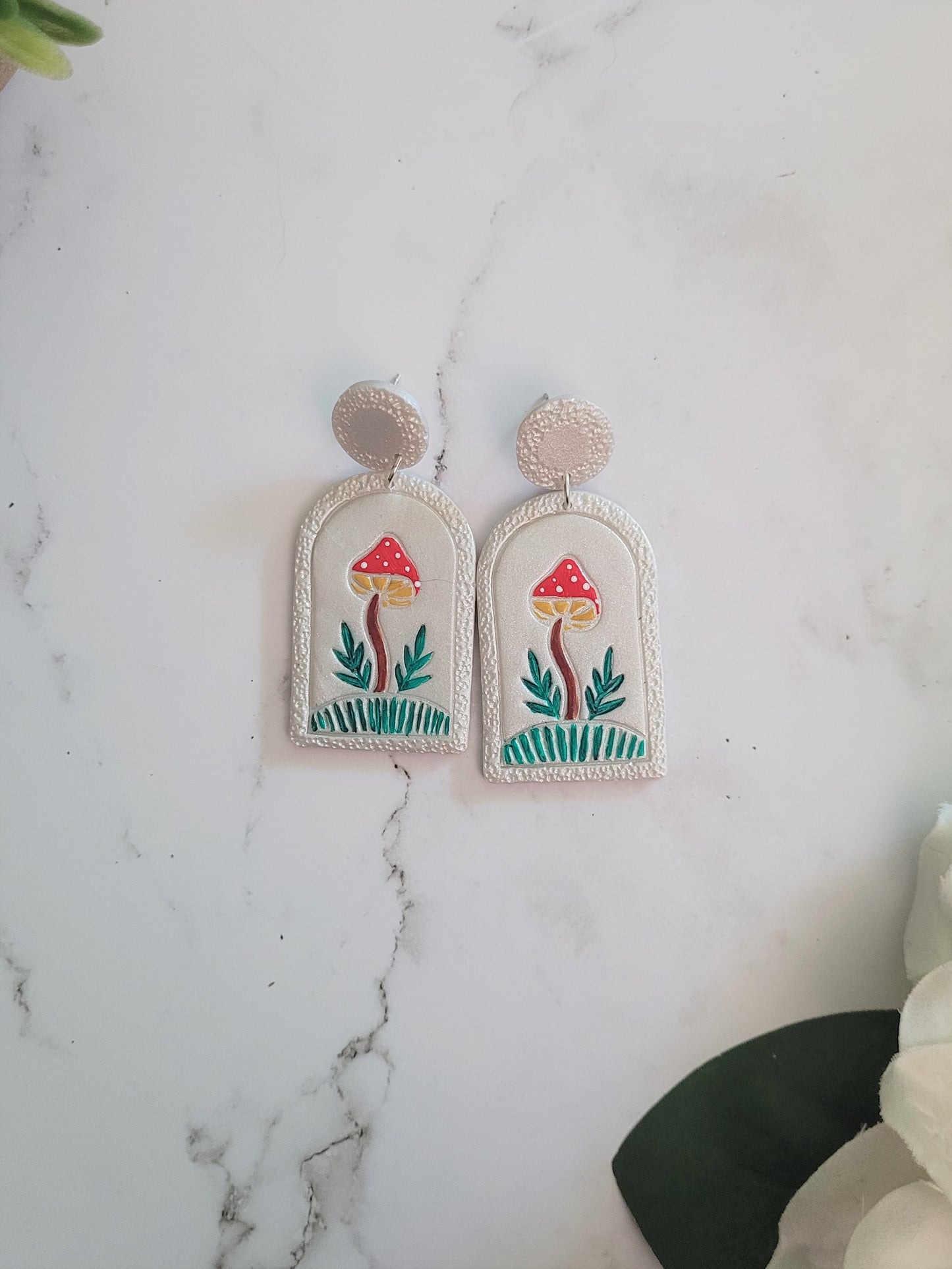 Pearl earrings with painted mushroom