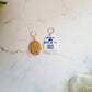 Gold and White robot earrings