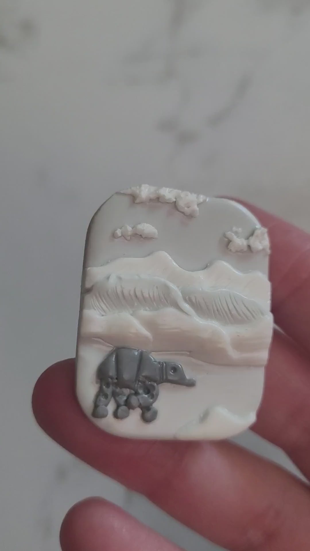 Close up of rectangle Brooch with a icy landscape